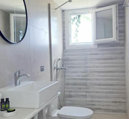 Chambre triple avec vue sur la mer Chambre avec vue sur la mer pour trois personnes - Hébergement à Paros Bizas