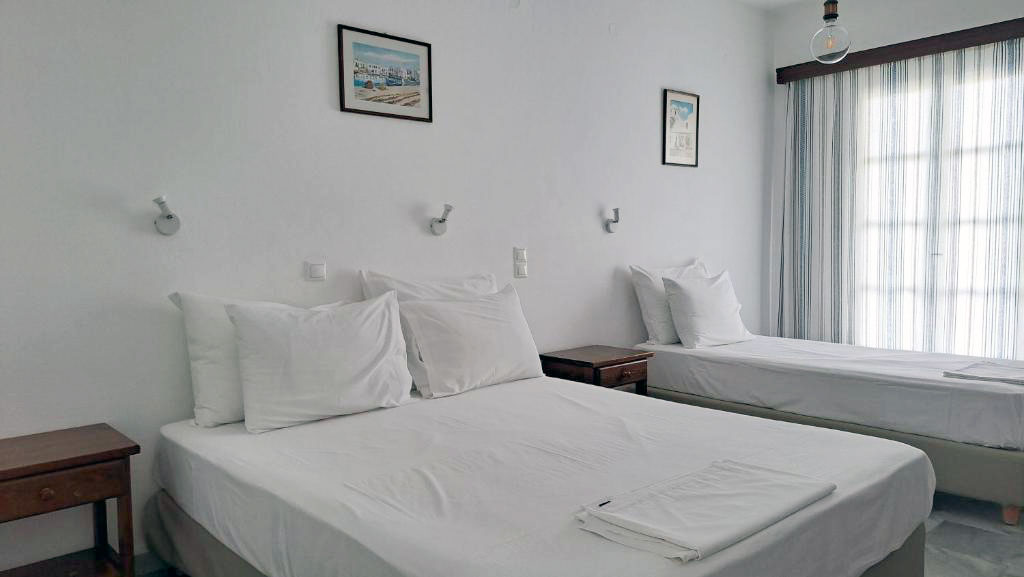 Chambre triple avec vue sur le jardin Chambre triple avec vue sur le jardin