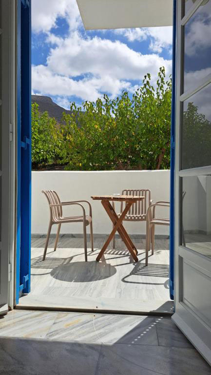 Chambre triple avec vue sur le jardin Chambre triple avec vue sur le jardin