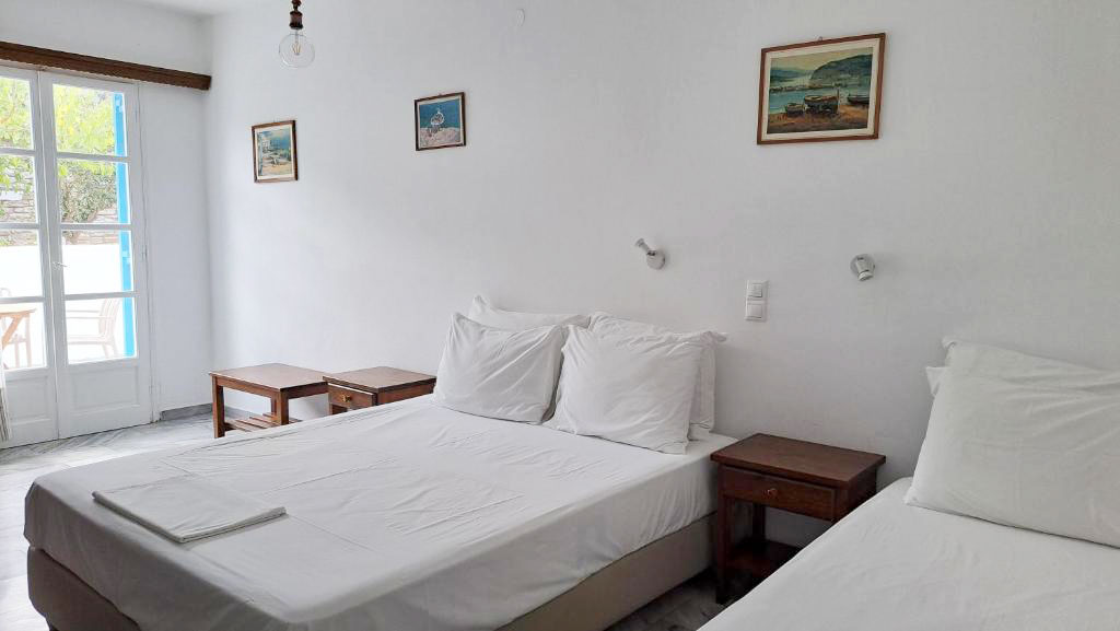 Chambre triple avec vue sur le jardin Chambre triple avec vue sur le jardin