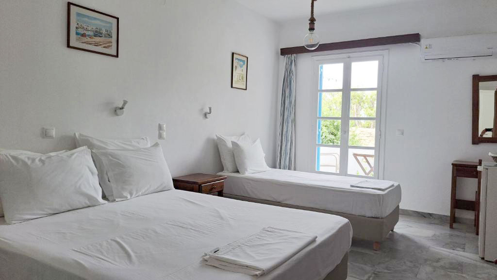 Chambre triple avec vue sur le jardin Chambre triple avec vue sur le jardin